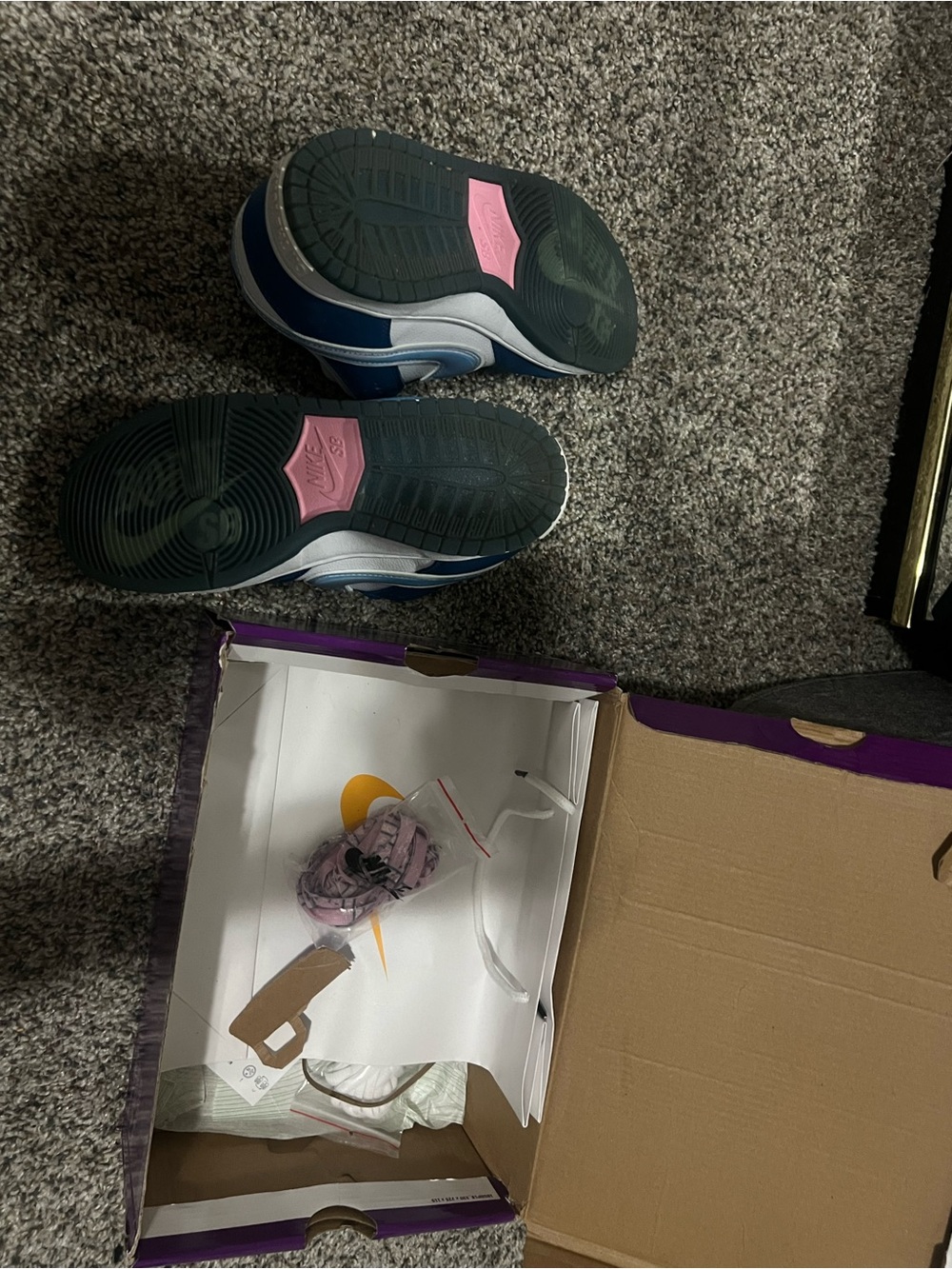 Nike women’s Navy and Pink Low-Top Sneakers